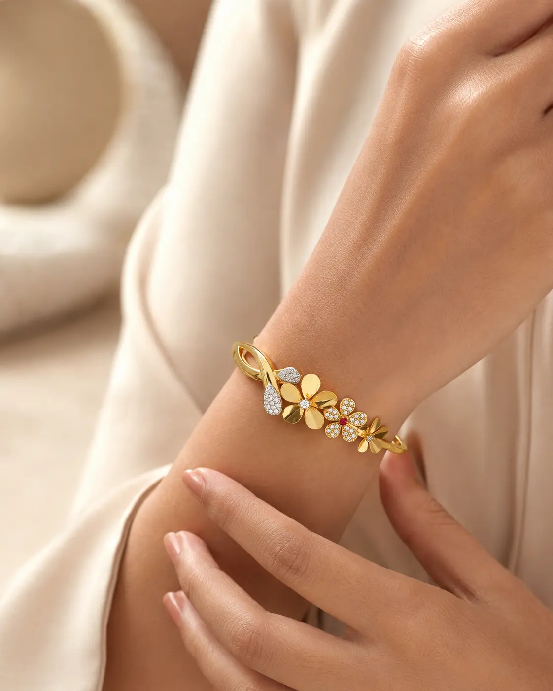 Model wearing an expressive floral Aarpee gold bracelet